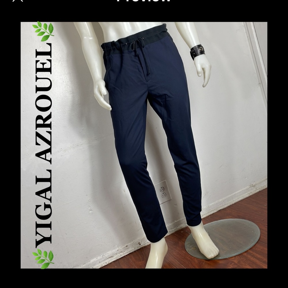 YIGAL AZROUEL